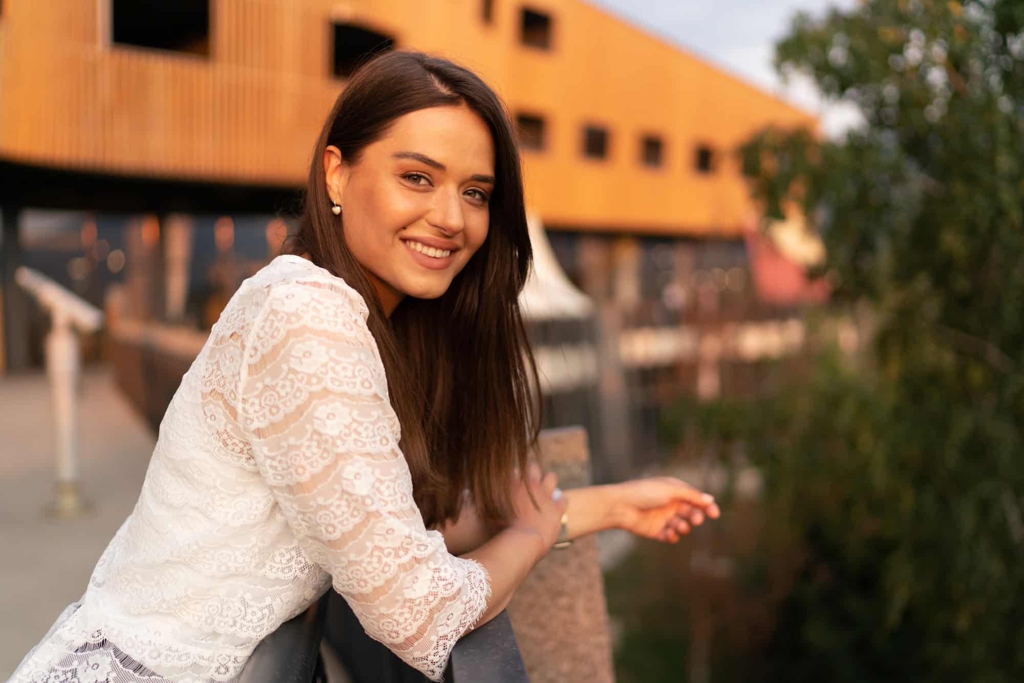 Pretty woman portrait in sunset light